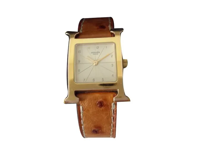 Hermès reloj Dorado 